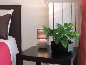 Postel nebo postele na pokoji v ubytování Artemide B&B
