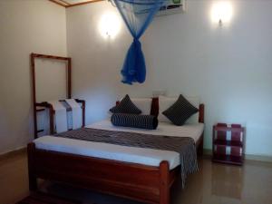 Postel nebo postele na pokoji v ubytování Hotel Samanala Sigiriya + 37 fotografií