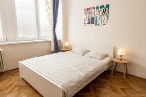 A bed or beds in a room at Best View Apartments