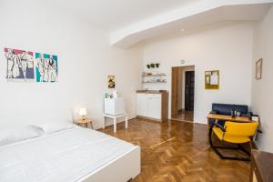 A bed or beds in a room at Best View Apartments