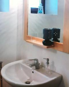 Een badkamer bij Ostello Sociale Borgo Venno