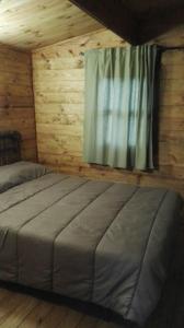 Postel nebo postele na pokoji v ubytování Resort Camping Solopuent