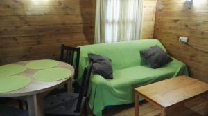 Predel za sedenje v nastanitvi Resort Camping Solopuent