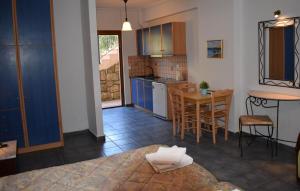 Kuchyň nebo kuchyňský kout v ubytování Melidron Hotel