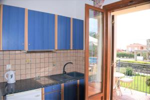 Kuchyň nebo kuchyňský kout v ubytování Melidron Hotel