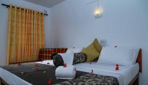 Postel nebo postele na pokoji v ubytování Hansa Surf Hotel