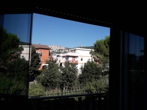 a view of a city from a window at casa Marilena in Tivoli