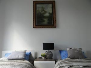 Łóżko lub łóżka w pokoju w obiekcie Beautiful City Centre Apartament