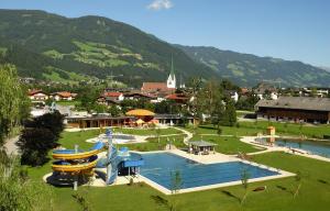 an aerial view of a resort with a water park at Ferienwohnungen Bäckenhaus in Stumm