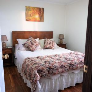 Een bed of bedden in een kamer bij Cabañas Cerro Zapata