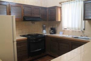 Kuchyň nebo kuchyňský kout v ubytování Quinta Comala Hotel & Villas