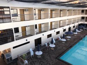 an overhead view of a hotel with a pool at La Primera Grande Beach Resort in Roxas