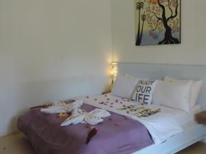 Ein Bett oder Betten in einem Zimmer der Unterkunft Casus Dream Hotel