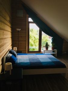Postel nebo postele na pokoji v ubytování Room in a Scandinavian Style House