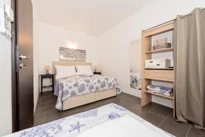 Ένα ή περισσότερα κρεβάτια σε δωμάτιο στο Lozna Residence
