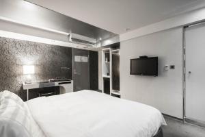 TV a/nebo společenská místnost v ubytování Saual Keh Hotel