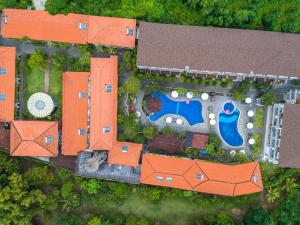Bazén v ubytování Kuta Beach Club Hotel nebo v jeho okolí