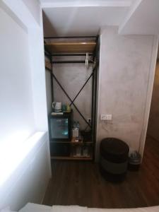 an overhead view of a room with a tv and a floor at Homy Central in Hong Kong