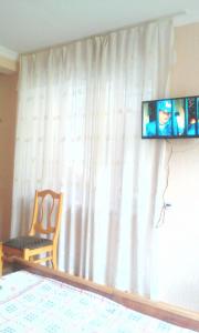 Телевизор и/или развлекательный центр в Guesthouse Valeria