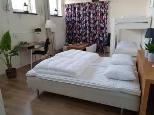 Letto o letti in una camera di Alkoven Logi