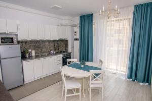 Kuchyň nebo kuchyňský kout v ubytování Apartament Solid Residence Georgia