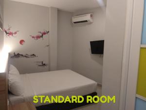 TV a/nebo společenská místnost v ubytování Lavana Hotel Batu Caves