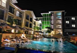 a swimming pool at night in a hotel at Fairways and Bluewater Boracay in Boracay