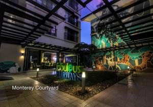 a building with a mural of giraffes on it at Fairways and Bluewater Boracay in Boracay