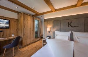 Ένα ή περισσότερα κρεβάτια σε δωμάτιο στο Hotel Karlwirt