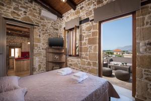Posteľ alebo postele v izbe v ubytovaní Doro Villas + 37 fotografií