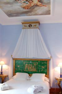 
Een bed of bedden in een kamer bij La Casona de Yaiza
