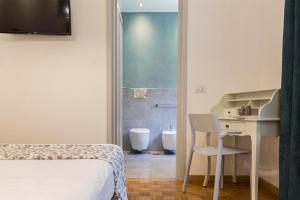 Posteľ alebo postele v izbe v ubytovaní Dulcis In Vatican b&b