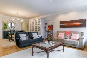 A seating area at Gran Via 1.2 by Forever Rentals