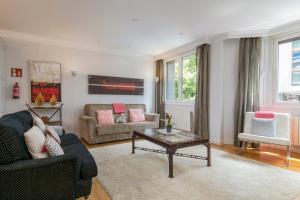 A seating area at Gran Via 1.2 by Forever Rentals