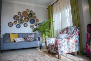 Posezení v ubytování Villa Karibu Serviced Apartments-Kampala