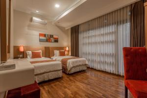 Letto o letti in una camera di Gracia Spa Resort Hotel