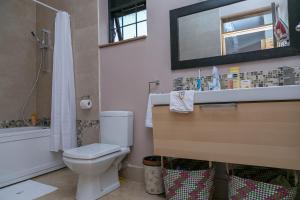 Koupelna v ubytování Villa Karibu Serviced Apartments-Kampala