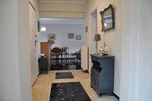 a hallway with a living room and a dining room at Unique flat of refined luxury and splendid views. in Kavala