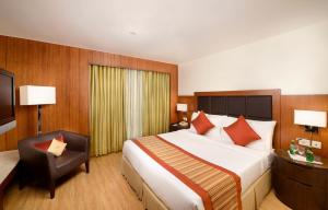A bed or beds in a room at Svelte Delhi, a member of Radisson Individuals