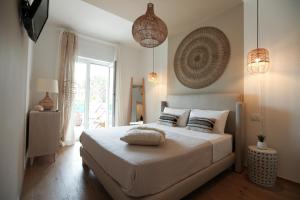 A bed or beds in a room at Amor di Casa