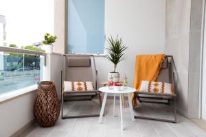 A seating area at Amor di Casa