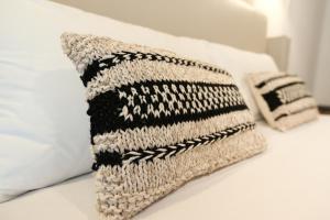 A bed or beds in a room at Amor di Casa