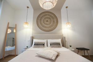 A bed or beds in a room at Amor di Casa