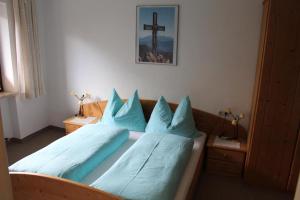 Postel nebo postele na pokoji v ubytování Lamplhof B&B