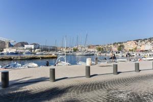 a marina with boats in the water and a harbor at Jolie T2 la ciotat in La Ciotat