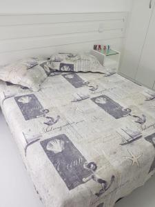 Ein Bett oder Betten in einem Zimmer der Unterkunft Porto Real Resort