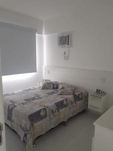 Postel nebo postele na pokoji v ubytování Porto Real Resort