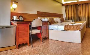 Postel nebo postele na pokoji v ubytování Hotel Samraj