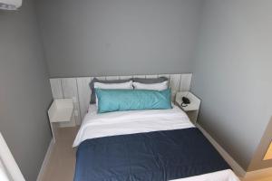 Postel nebo postele na pokoji v ubytování Hotel Bossa Nova Cabo Frio