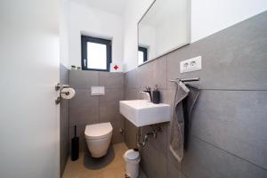 Koupelna v ubytování Mari House